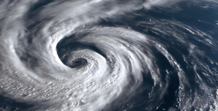 A home enduring a hurricane, illustrating hurricane damage coverage.